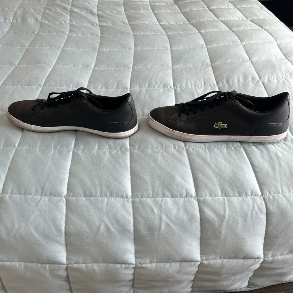 Size 13 Lacoste black shoes. Worn only a few times.